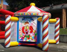 Each game is placed under a high peaked red and white carnival tent. Carnival Game Rentals Houstonbouncehouses Com Houston Tx