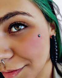 Microdermal Piercing In 2021 Microdermal Piercing Cheek Piercings Facial Piercings