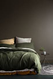 From Dark And Moody To Stark And Crisp Discover The Latest Interior Colour Trends Green Bedding Bedroom Green Dreamy Bedrooms