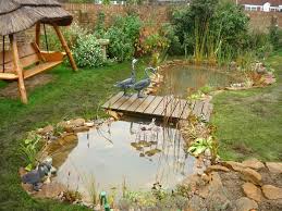 The outflow hydrograph from the upper pond should be used as the inflow hydrograph for the lower pond. Small Backyard Pond With Bridge Novocom Top