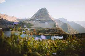 Hidden lake is surrounded by numerous peaks, including bearh. You Need This Hike To Hidden Lake In Glacier National Park At Sunset The Mandagies