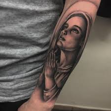 It's bold, but smoothly delivered and clever with details and shading. 41 Virgin Mary Tattoos With Religious Connections And Meanings Tattooswin
