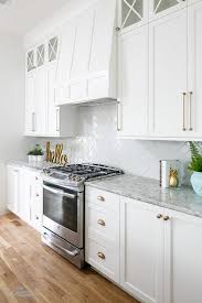 White Kitchen Cabinets With Champagne Gold Hardware Transitional Kitchen In 2020 Kitchen Cabinets Decor Kitchen Cabinet Design Kitchen Cabinet Trends