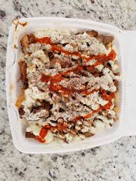 I Ate Shawarma Poutine With Garlic And Tahini Sauce Food Network Recipes Eat Tahini Sauce