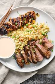 Japanese Hibachi Steak And Salmon Cooking With Curls