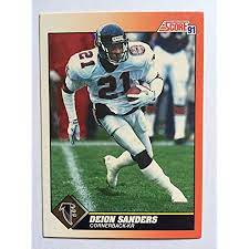 Sanders is pictured in a profile shot, with a sky blue background. Amazon Com 1991 Score Football Card 395 Deion Sanders Collectibles Fine Art