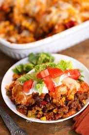 This taco tater tot casserole combines crispy tater tots & your favorite taco ingredients! Taco Tater Tot Casserole