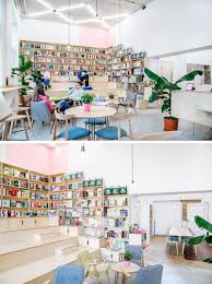 At One End Of This Coffee Shop Bookshop Is Stadium Seating That S Surrounded By Bookshelve Coffee Shop Interior Design Coffee Shops Interior Houses In Poland