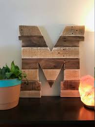 Put flat the torn apart pallet wood slats to shape up the background rustic wooden board and next mount the metallic. 26 Best Diy Pallet Wall Decor And Art Ideas For 2021