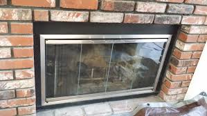 We work with all types of fireplaces and fire pits, and we can perform custom installations or replacements, including fitting glass doors to existing openings. Custom Made Satin Nickel Finished Fireplace Glass Doors