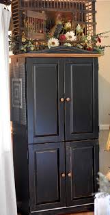 Craft Armoire With Folding Sewing Table In 2020 Craft Armoire Folding Sewing Table Sewing Room Furniture