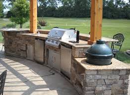 Big green egg outdoor kitchen big green egg table outdoor kitchen patio outdoor kitchen countertops outdoor kitchen design green eggs modular outdoor kitchens outdoor grill station barbecue. Golf Course In The Background Of This Beautiful Open Outdoor Kitchen The Big Green Egg Built Rig Outdoor Barbeque Outdoor Kitchen Design Outdoor Kitchen Patio