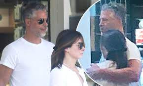 Bryan randall is an american professional photographer, who is known for his outdoor and children's photography. Sandra Bullock Is Seen Hugging Her Photographer Beau Bryan Randall Daily Mail Online