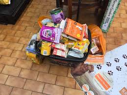 Some foodbank customers have pets, especially dogs or cats, so pet food is welcome. Hartley Wintney Pet Food Bank Community Ad