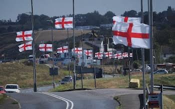 Labour minister demands 'unsettling' Union flags be taken down