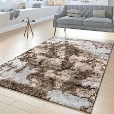 Zeitgenössische teppichdesigner interpretieren die jahrhunderte alte tradition des teppichknüpfens ganz neu und zeitgemäß. Designer Teppich Florale Ornament Grau Braun Teppichmax