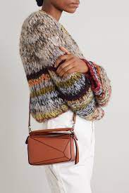 We did not find results for: Tan Puzzle Mini Textured Leather Shoulder Bag Loewe Net A Porter