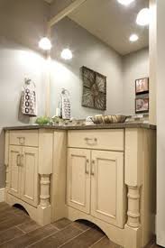 This off white bathroom vanity provides the simplicity that this room deserves, proving that sometimes it's the quiet statement that has the most to say. Request A Brochure Dura Supreme Cabinetry Kitchen Cabinets In Bathroom Bathroom Cabinetry Classic Bathroom