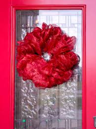 Loop the top of the bottom wreath to the bottom of the middle wreath. How To Make A Mesh Ribbon Wreath Chica And Jo