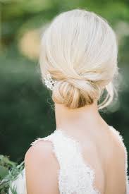 Diagonal braid side bun a perfect side braided bun hairstyle for both every day and a formal occasion. 20 Ways To Style Your Hair In A Low Bun On Your Wedding Day Martha Stewart