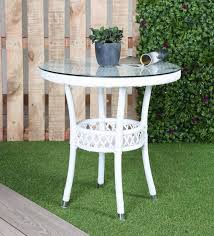 The pedestal collection, including the saarinen coffee table, was the result of eero saarinen addressing the unrestful world underneath chairs and tables. Buy Evon Outdoor Coffee Table In White Colour By Ventura Online Patio Tables Tables Furniture Pepperfry Product