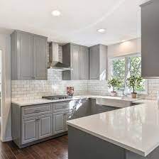 Maybe you would like to learn more about one of these? Gray Shaker Cabinets White Quartz Counter Tops Grecian White Marble Subway Tile And A Farmhouse Sink A Timeless Kitchen Kitchen Cabinets Decor Kitchen Design