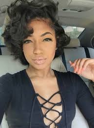 This shaved cut certainly brings a different kind of femininity. Next Style Iono Short Curly Hair Natural Hair Styles Short Hair Styles