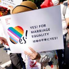 Japan enacts watered-down LGBT understanding law | Reuters