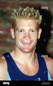Iwan Thomas, who won five gold medals in 1998, competing in the 400m in the  European Championships and Commonwealth Games, at Madame Tussaud's in  London where he unveiled his waxwork double. The