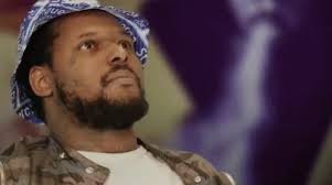 Two little soldier boys playing with a gun; Rapper Schoolboy Q Accused Of Masterminding A Felony Armed Robbery Lipstick Alley