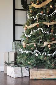 The magnificently decorated tree, the warm fire, christmas blankets, and pillows are lounging on the. Neutral Rustic Christmas Tree Little Glass Jar