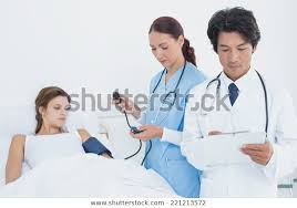 Doctor Holding Medical Chart Nurse Checks Stock Photo Edit