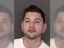 Man arrested after assaulting victim during investigation