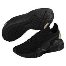 Black And Gold Puma Shoes Thumbnail 2 Of Defy Varsity Women S Sneakers Puma Black Metallic Gold Medium Nike Sneakers Women Black And Gold Shoes Leather Shoes Woman