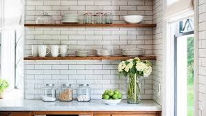 Inspiration for a craftsman galley open concept kitchen remodel in san francisco with shaker cabinets, paneled appliances and medium tone wood cabinets edging between different. Open Shelving In The Kitchen Pros And Cons Realtor Com
