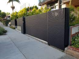 If you need a driveway gate, fence or wall topper. No Rust No Fuss Seamless Contemporary Design Gate Wall Design House Gate Design Front Gate Design