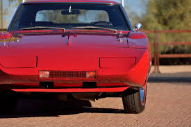 A nascar is more than twice the weight of a formula 1 car. The Dodge Charger Daytona The First Nascar Racer To Break 200 Mph