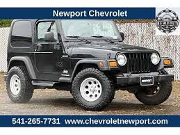 Image result for Brilliant Black 2005 Jeep