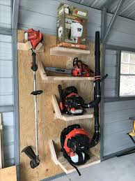 Storage For Those Oddly Shaped Tools And Lawn Equipment Equipment Lawn Oddly Shape Garage Organisation Storage Shed Organization Garage Organization Tips