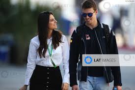 Hat is almost like good times, bad times: Sochi Autodrom Sochi Russia Sunday 30 April 2017 Daniil Kvyat Toro Rosso With His Girlfriend Kelly Piquet World Copyright Coates Lat Images Ref Digital Image An7t4114 Round 4 Russian Grand Prix Motorsport Images
