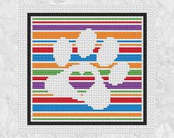You can also make the pattern bigger and stitch it on plastic canvas for a 3d christmas tree to put up in an office or small living area. Easy Paw Print Cross Stitch Pattern Printable Dog Counted Etsy Cross Stitch Patterns Cross Stitch Marvel Cross Stitch