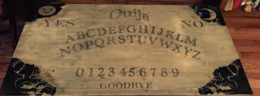 I wanted a cool, unique coffee table for my house, but couldn't find anything that i liked in my price range. Ouija Board Coffee Table