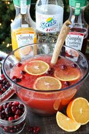 This Non Alcoholic Cranberry Orange Mocktail Is An Easy And Refreshing Fruit Punch Drink For The Holidays It S Fizz Punch Recipes Punch Drinks Breakfast Punch