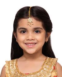 Just Shradhas presents Gold Kundan flower teeka available only at littl  tags.