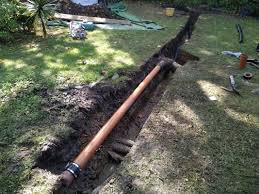 At the most basic, a swale is any depression in a landscape, existing or excavated, that redirects water drainage. How To Drain Your Garden Solve Garden Drainage Problems Buckinghamshire Landscape Gardeners