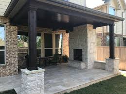 A diy pathway made of stone pavers is a great way to save your lawn from being trampled and compacted by foot traffic. Patio Builders Montgomery Tx Magnolia Tx Conroe Tomball Spring Envy Exteriors Patio Builders Patio Backyard Patio Designs