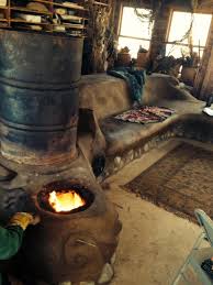 Get your feet wet with gasification and build this cute little stove using tin cans. Rocket Stoves Earth Ovens Strawbale Studio