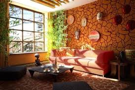 The rug is a vintage tuareg, the ceiling beams are douglas fir, and the room is. African Decor Living Room Shefalitayal