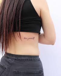 Words Love Yourself Inked On The Right Rib Cage By Tattooist Zaya Discreet Tattoos For Women Love Yourself Tattoo Tattoos For Women Small