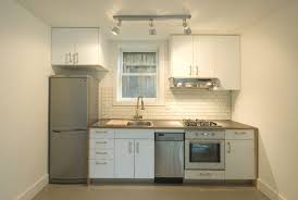 Compact Kitchen W Small Refrigerator Small Dishwasher Small Gas Range Oven Tiny Kitchen Design Simple Kitchen Design Small Apartment Kitchen